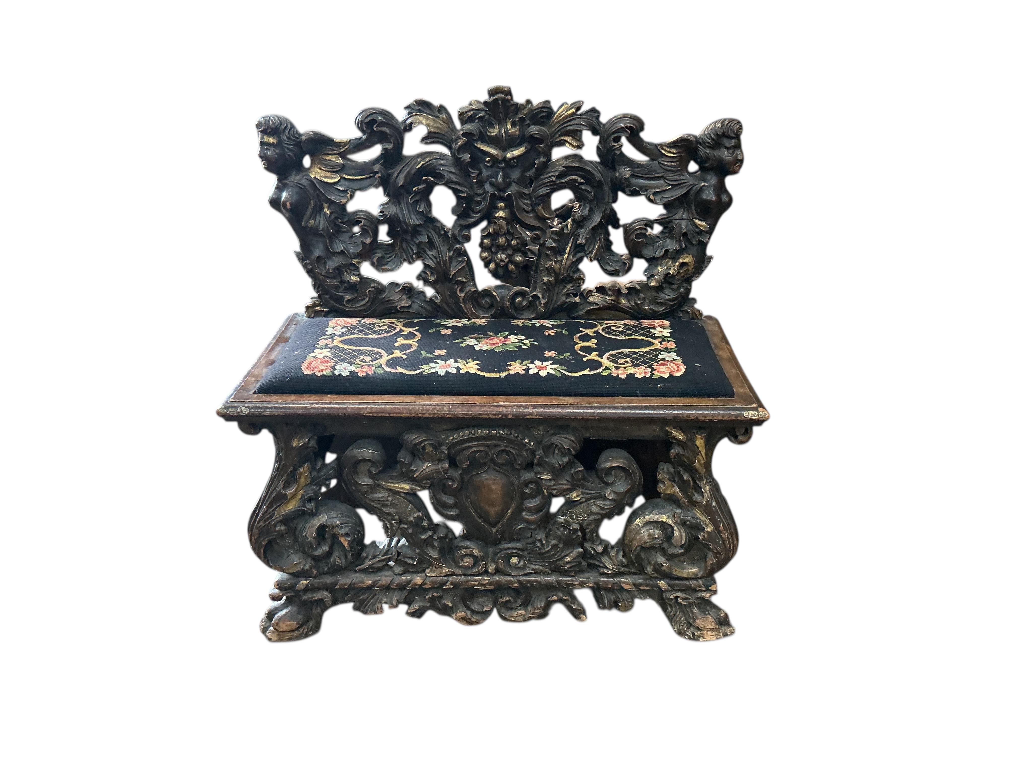 A 19th century Italian giltwood and later painted carved bench, width 95cm, depth 46cm, height 92cm